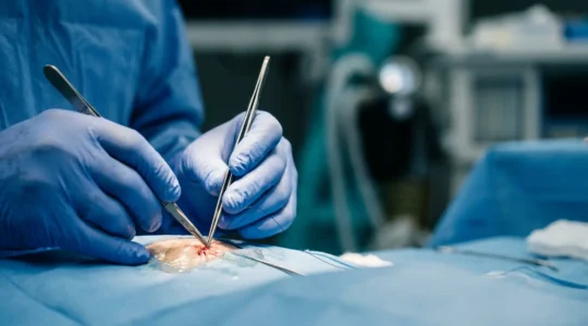 Dramatic emergency medical scene showing microsurgical precision in trauma care
