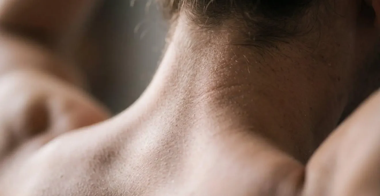 Close-up of neck muscles showing deep stabilizer engagement during controlled exercise movement