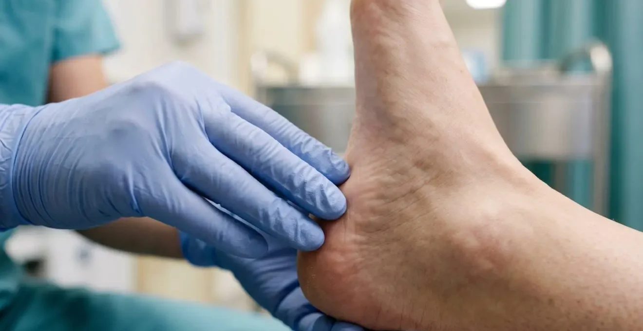 Close-up of a specialized foot examination demonstrating professional diabetic foot care assessment