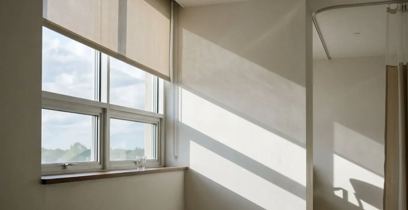 Natural daylight streaming through hospital window promoting healthy day-night cycle